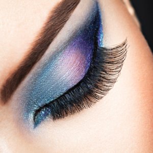 Woman's eye with blue eye makeup